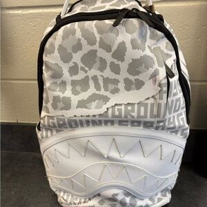 White and Gray Patterned Limited Sprayground Backpack